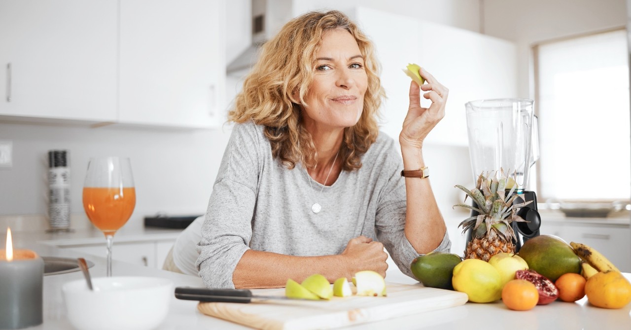Woman eating fruit
