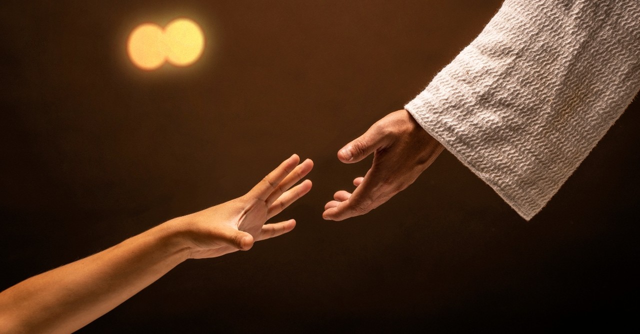 Reaching for Jesus' hand